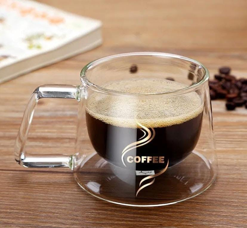 Transparent double bottom glass mug